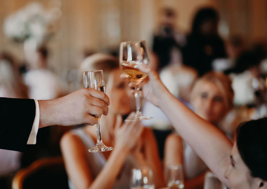 wedding couple getting toasted