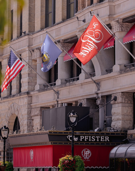Pfister hotel exterior shot with flags waving