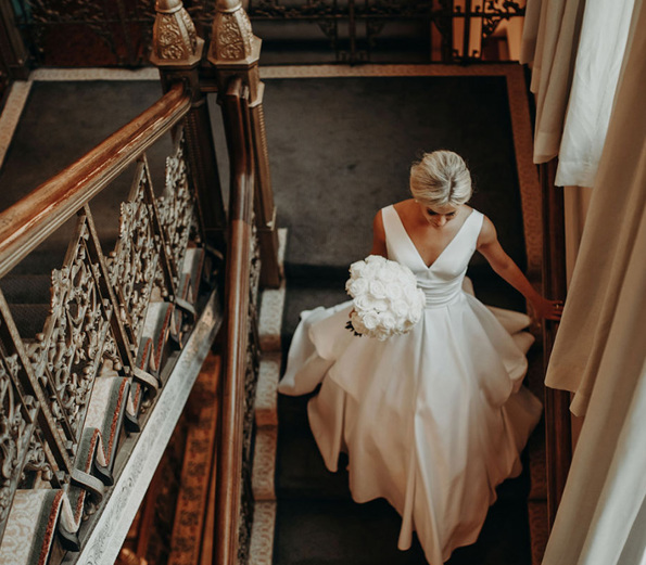 Bride descending staircase  