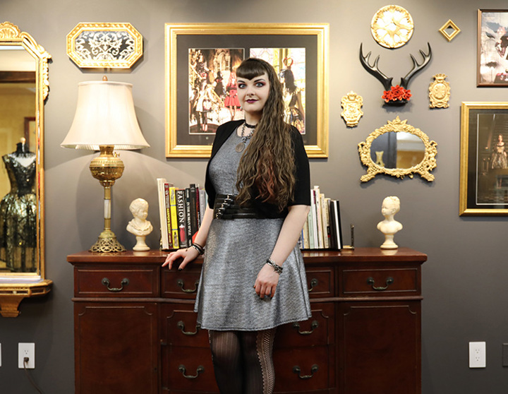 Stephanie Schultz in front of her artwork