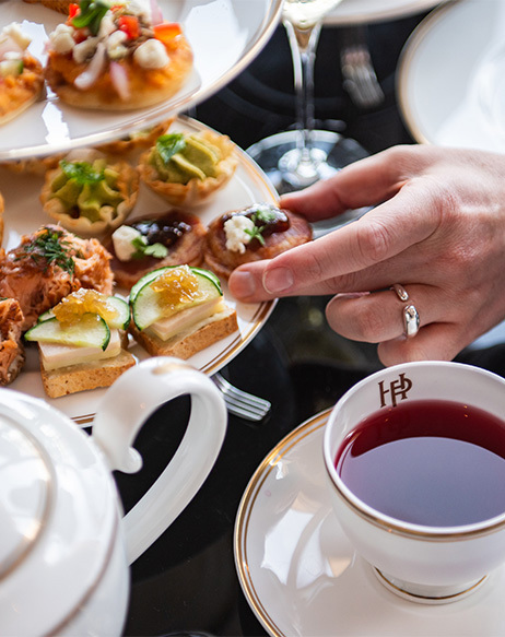 tea table set with finger sandwiches